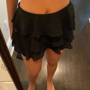 Ruffled black mini skirt